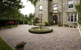 Newly cleaned driveway outside a manor house